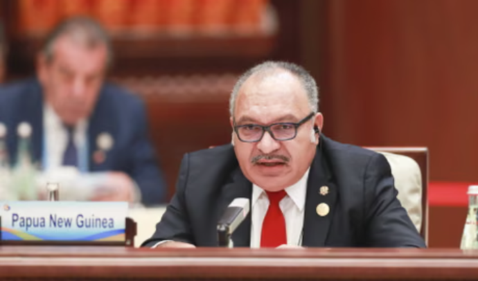 Hon. Peter O'Neill at an international summit representing Papua New Guinea